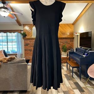 Black dress with ruffle sleeve